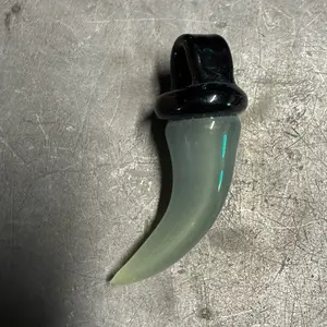 “Potion” Color Changing Lion Fang Pendant