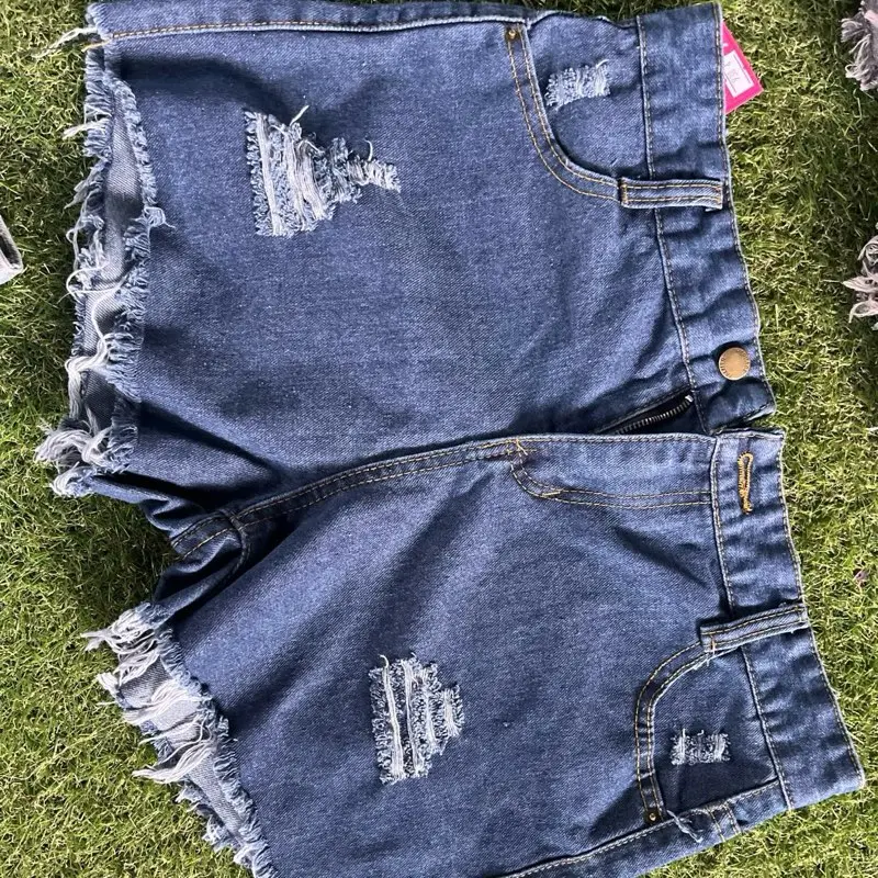 Blue distressed shorts