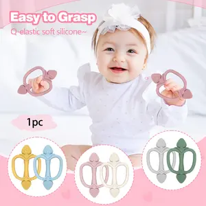 This baby silicone teether, Sensory teether, strawberry-shaped, features a multi-textured design, is a food-grade teething toy, and is BPA-free, making it a perfect gift for newborns.