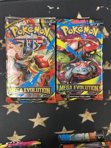 Single Mega Evolutions Pack Ripp with a 1 and 8 chance at winning a Graded Pokemon Slab.
