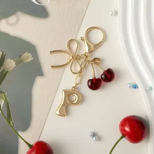 Gold Plated Glitter Cherry Keychain Bubble Initial Keychain with Bow & Cherry - Gold Letter Bag Charms for Women, Cute Purse Handbag Accessories
