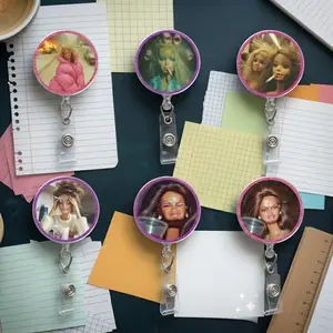 Disgusted Doll Face Badge Reel, Retractable ID Clip, Funny Nostalgic Kitsch Keychain for Nurses, Teachers, and Office Workers