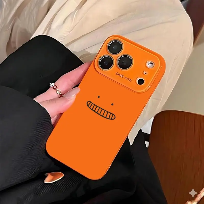 Pink phone case with a fun, grinning little man emoji design. Suitable for iPhone 17 Pro Max, 16 Pro Max, 15 Pro Max, and 14 Pro Max. Includes lens protection. Also suitable for iPhone 15, 14, 13, and 12. Made of skin-friendly TPU material.