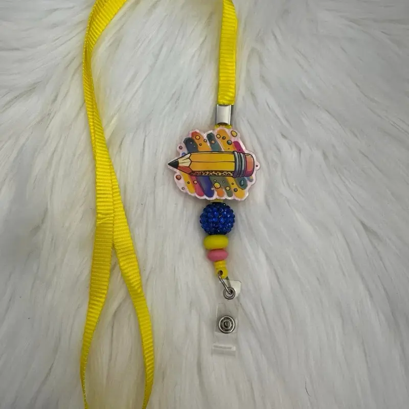 Pencil badge reel lanyard