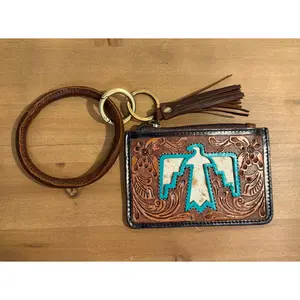 Turquoise Thunderbird Tooled & Cowhide Wristlet