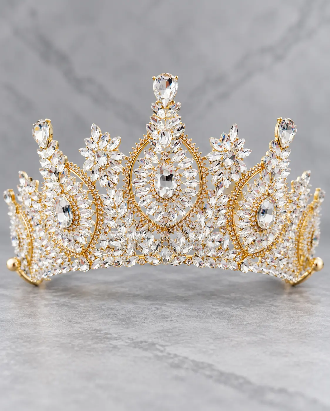 Elegant Gold Crown with Crystal Accents and Intricate Design for Special Occasions