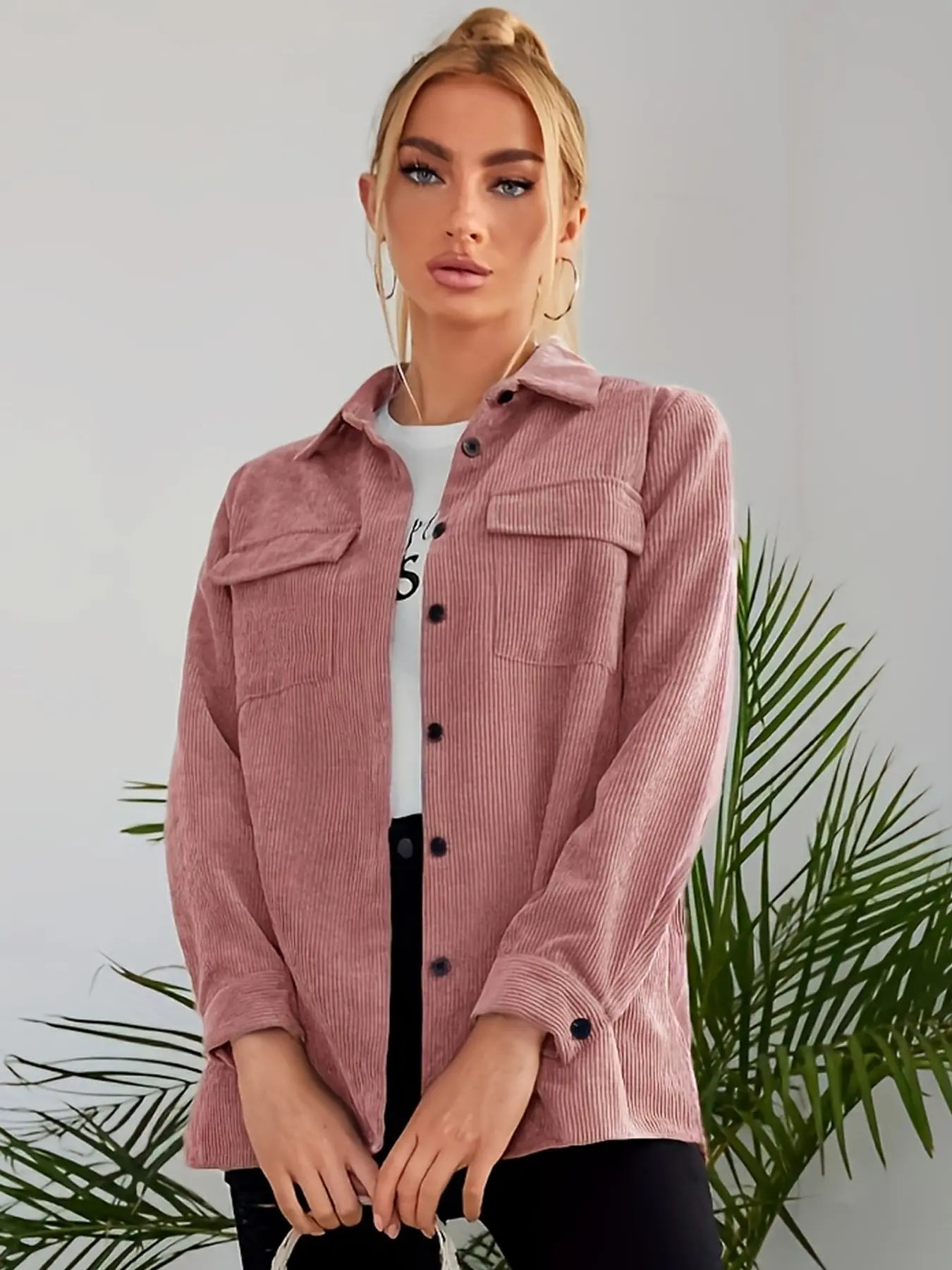 A women's pink fashionable casual corduroy long sleeved shirt, with a casual fit that is super comfortable and suitable for commuting to work, shopping and outdoor activities, indoor and outdoor dressing