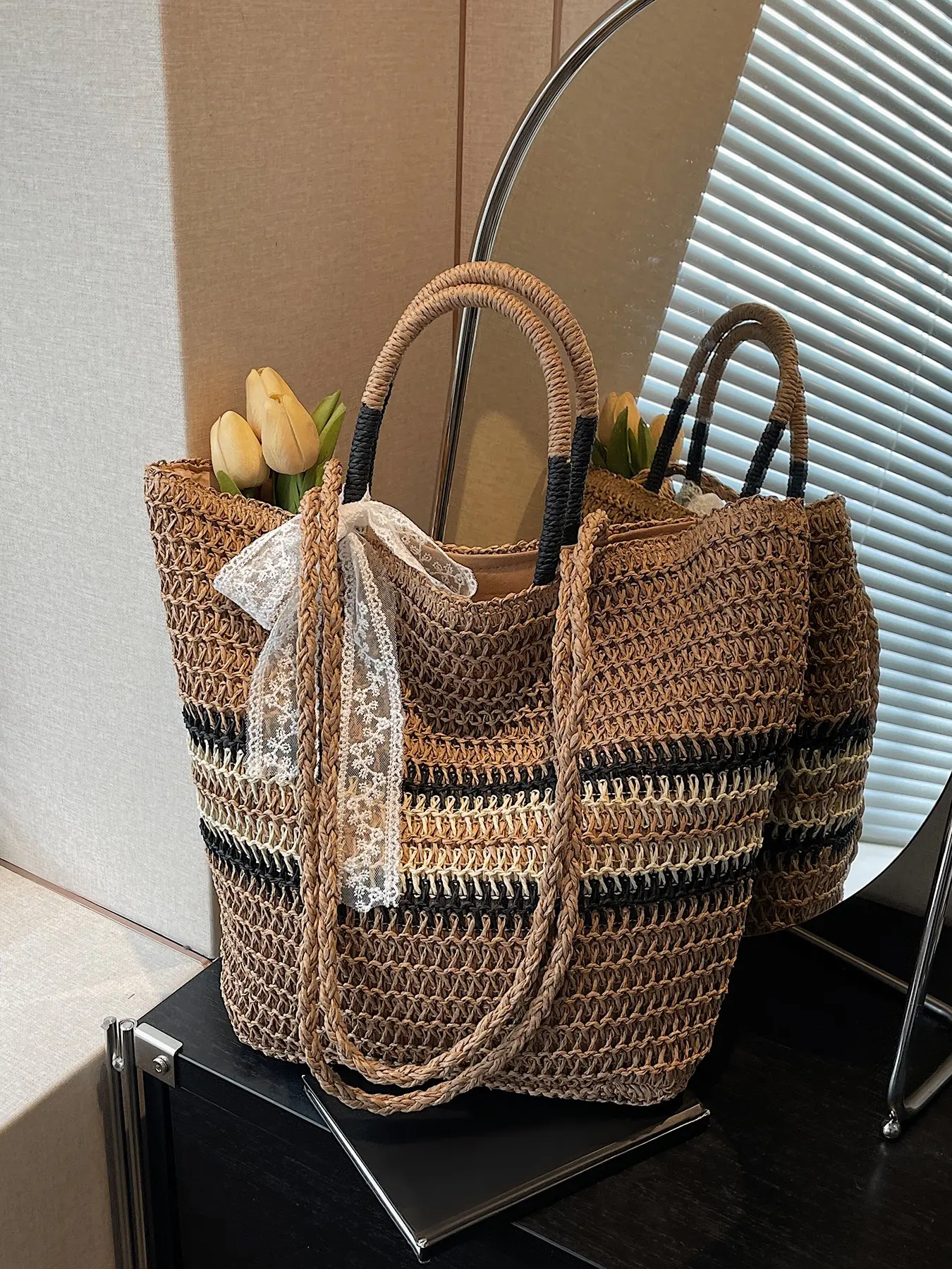 Vacation style casual simple and versatile straw woven handbag with lace bow decoration, retro niche personalized practical single shoulder crossbody bag, suitable for outdoor travel, shopping, and gatherings