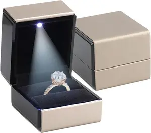 Novel Box Square Shaped Gold Ring Box With LED Light 2.25X2X2.5 Inches Jewelry Ring Case Best for Jewelry Displays Gift Boxes for Mother's Day Engagement Anniversary & more Happy Occasions
