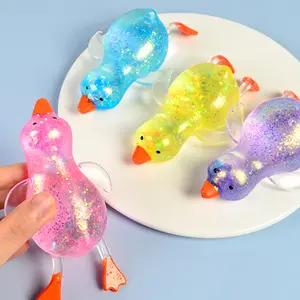 Explorinox 5.12*2.76inch Squeeze Random colors Duck Stress Relief Toy Mini Stretchy Soft TPR Fidget Toy with Sparkling Design for Anxiety Relief & Sensory Stimulation