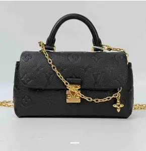 Pre-owned Louis Vuitton leather Crossbody Bags Nano Madeleine