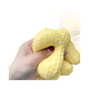 Peanut-shaped squeezeable toy for stress relief, with stuffing and a soft feel.