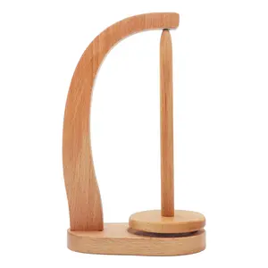 A wire reel holder for crochet and knitting, a wooden reel spinner with magnetic rotating device and anti-slip pad, a rotatable swinging yarn ball distribution stand, suitable for crochet gift for knitting enthusiasts