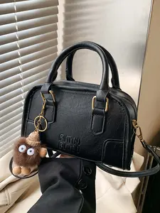 Simple classic retro Boston handbag, Casual trendy handbag, Casual bags, paired with a cartoon pompom pendant, casual, versatile, crossbody bag, available in a variety of colors, niche design suitable for daily commuting, shopping