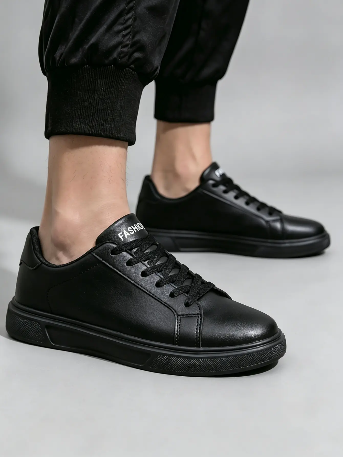 Men’s Full Black Leather Low Top Skate Sneakers, Water Resistant Easy Clean Casual Lace-Up Board Shoes, Cushioned Non-Slip Daily Walking Trainers for Work & Street