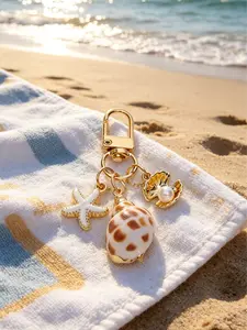 1pc Asymmetrical Shell, Starfish, And Conch Wallet Pendant Decorative Keychain, Nautical Keychain, Ocean Element Conch And Starfish Keyring, Bag Charm For Girls, Vacation Style Accent Piece, Versatile Commuter Decoration, Oceanic Elements, Nautical Theme