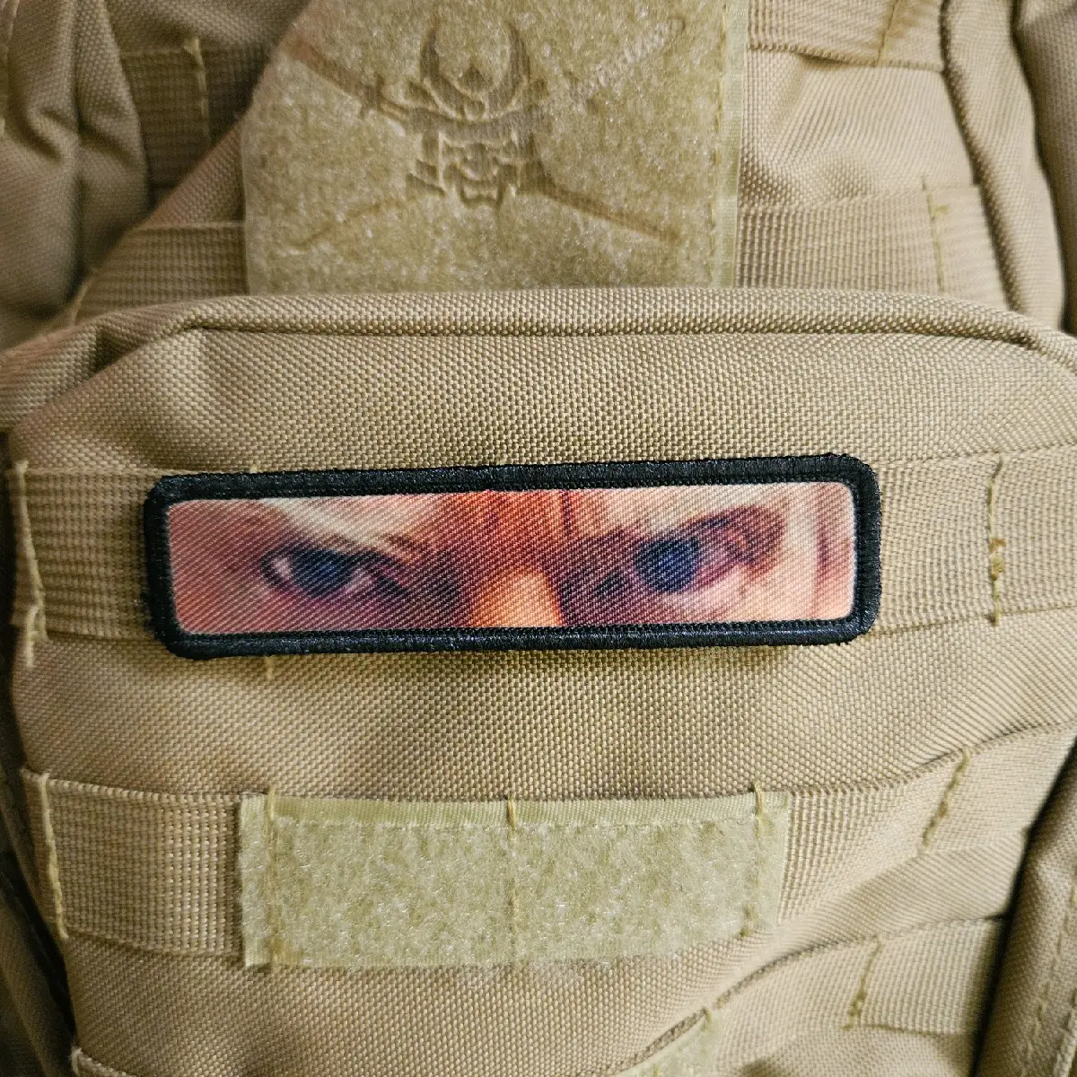 mug shot eyes watching you 1"x4" removable patch with hook and loop backing