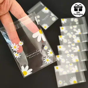 100pcs Daisy Print Gift Bags, Transparent Self-Adhesive Small Packaging Bags for Weddings, Birthdays, Christmas, Halloween, Gift Wrapping Supplies