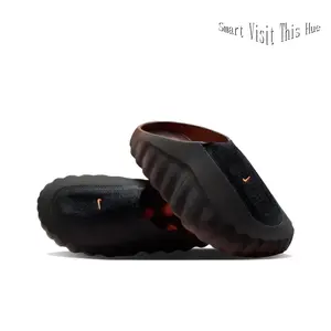 Monochromatic Black Fuzzy Clogs, Textured Chunky Slip-Ons with Contrast Orange Details, Casual Footwear for Streetwear & Night Vibes