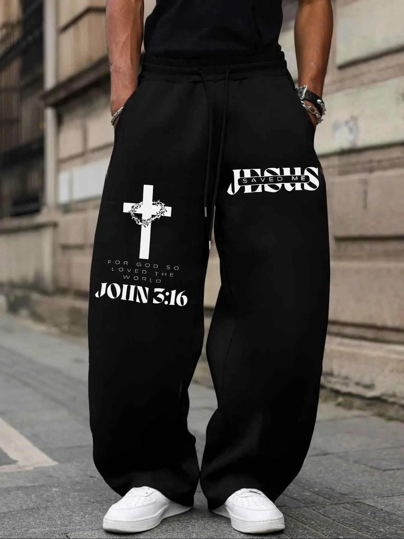 Unisex "JESUS SAVED ME" Christian Faith Oversized Sweatpants, Casual Comfy Sweatpants – Black & White Print, Gospel Streetwear Aesthetic, Athleisure Style Bottoms, Soft Fleece Fabric, Relaxed Baggy Fit, for Faith & Style Fans, Print