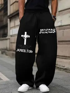 Unisex "JESUS SAVED ME" Christian Faith Oversized Sweatpants, Casual Comfy Sweatpants – Black & White Print, Gospel Streetwear Aesthetic, Athleisure Style Bottoms, Soft Fleece Fabric, Relaxed Baggy Fit, for Faith & Style Fans, Print