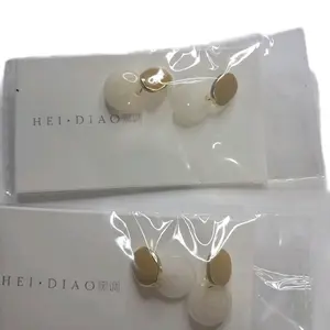 white pearl stud earrings for women