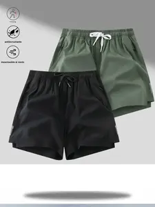 Two men's casual shorts with a simple sporty style, featuring an elastic waistband with drawstring for flexible adjustment. There are practical pockets on both sides, convenient for storing small items during activities. The fabric is lightweight and brea