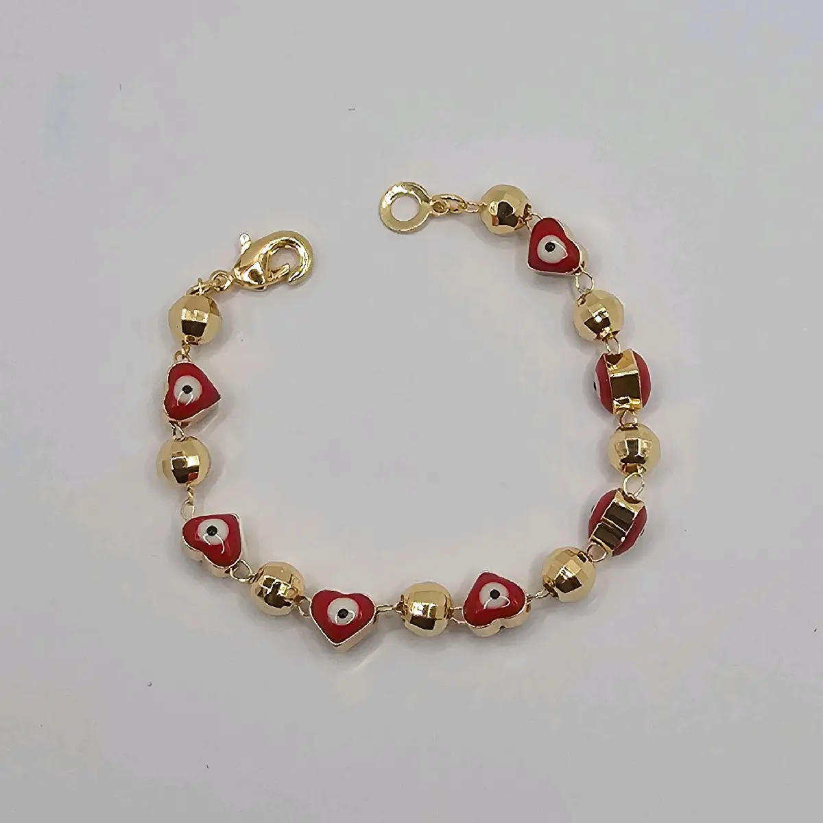 Hearts bracelet red gold-plated 6"inches no fade no tarnish just don't take long showers with them gold over stainless