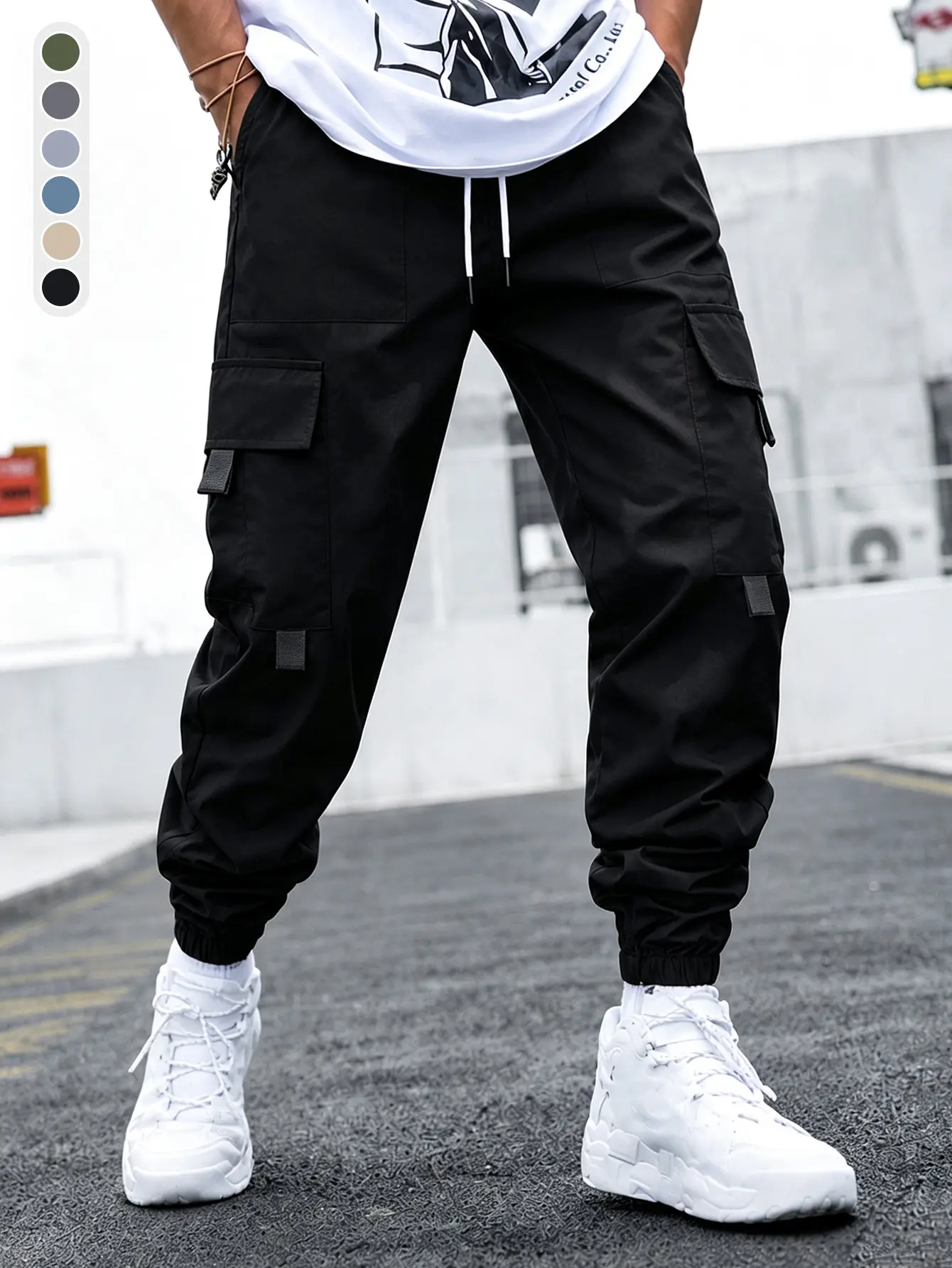 Men’s multi-pocket cargo jogger pants for summer—breathable, quick-drying, elastic waistband, straight-leg casual design. Durable multi-pocket construction, suitable for daily commuting and outdoor activities.