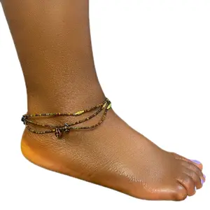 Tutu is natural tiny beads, brown in color, with some leaf designs. it's a 3 pieces anklet, and sizes  can be adjusted upon request via dm