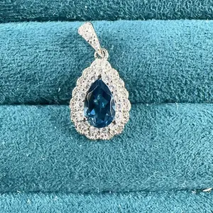 <PingEast jewelry > 925 sterling silver necklace featuring a natural London blue topaz teardrop-shaped pendant