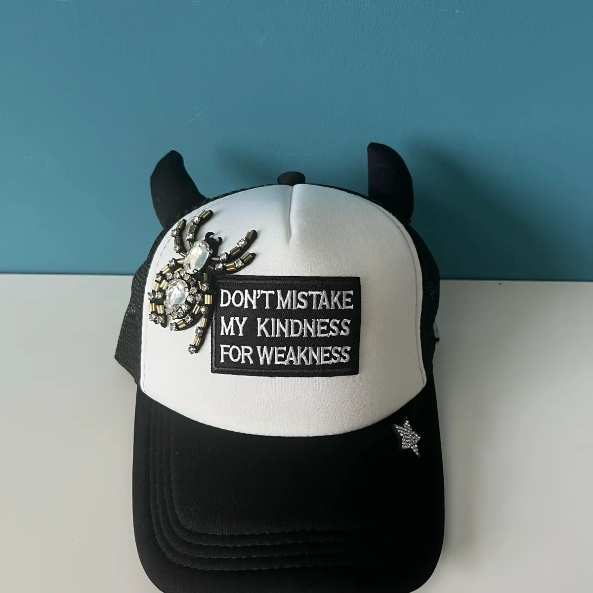 Don’t Mistake My Kindnes for Weakness Hat, stars, spider, horns