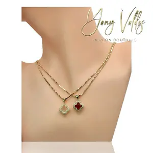 Paperclip chain necklace with clover pendant, available in red and clear colors.
