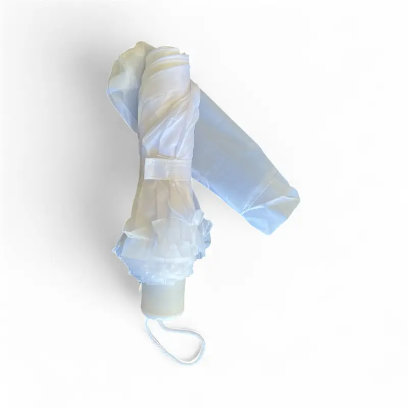 Sombrilla blanca.