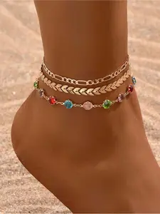 Bohemian-style gold ankle chain stack set, colorful gemstone jewelry. These gold ankle chains feature rainbow-colored gemstones and unique chain designs, making them suitable for music festivals, beach trips, or everyday bohemian style.