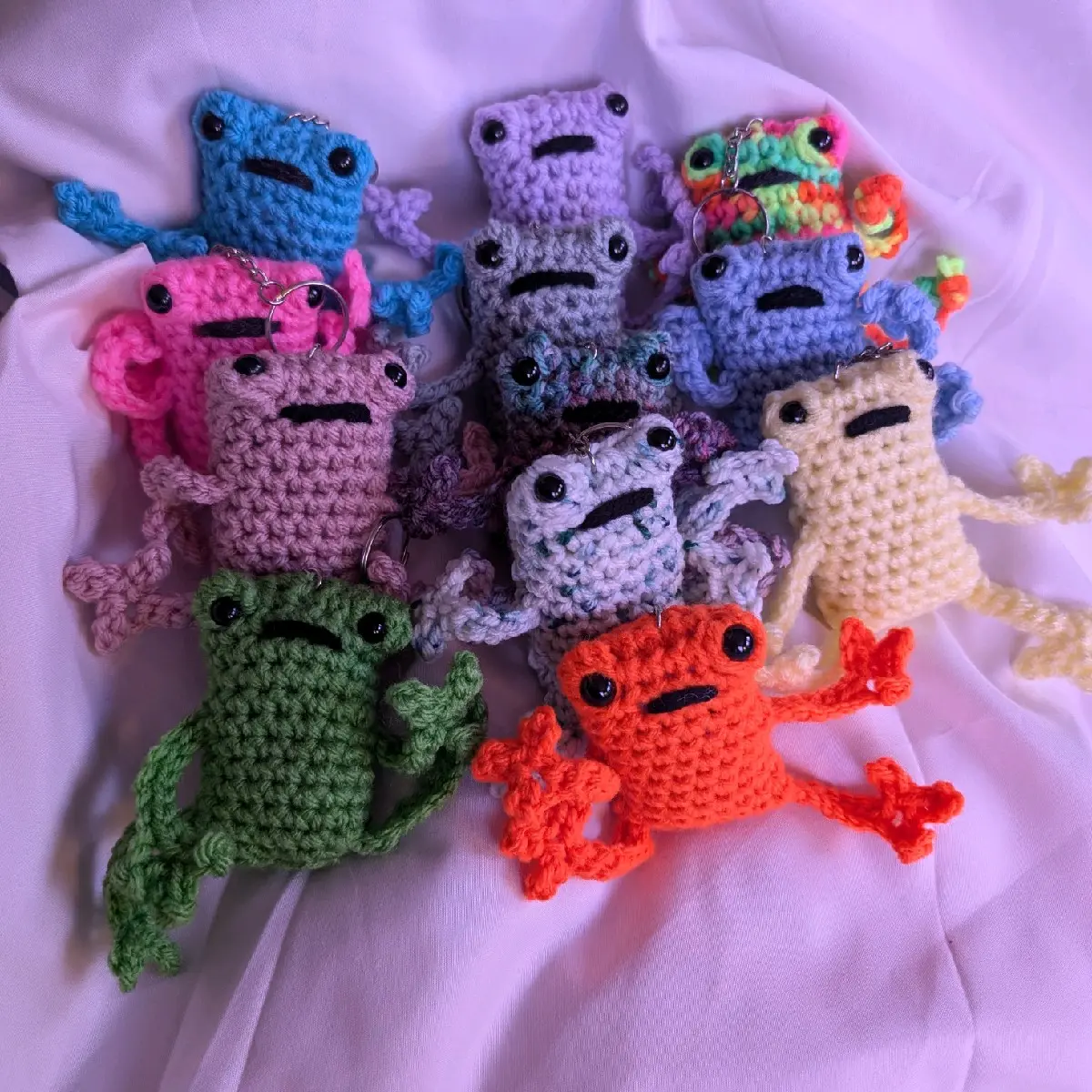 Small crocheted frog keychain