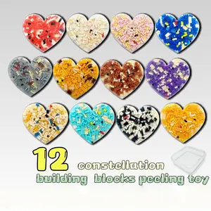 12 Constellation Building Block Peeling Toy - Unique Squeeze-Based Stress Relief with Heart-Shaped Panel & Zodiac Sign Assembly - Compact Portable Design for Easy Use