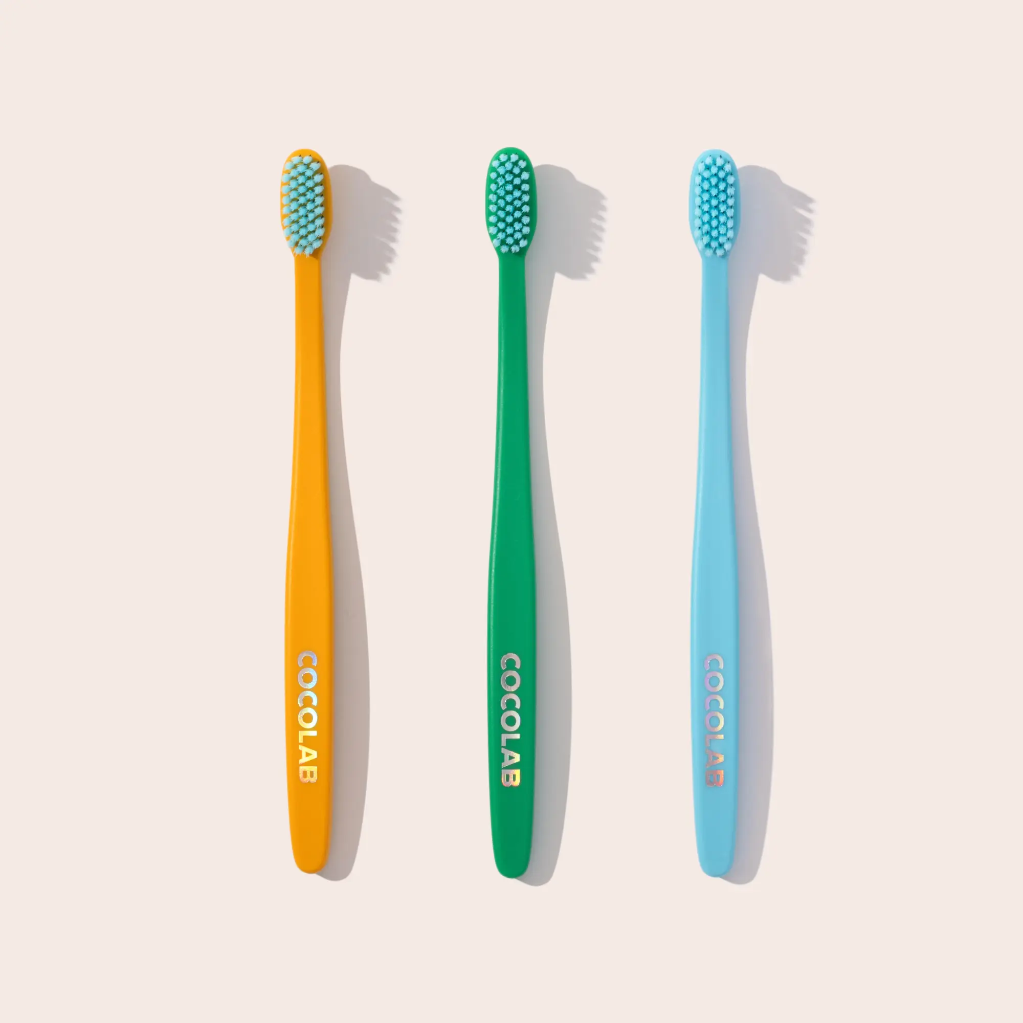 COCOLAB 3 Pack of Cocobrush Toothbrushes — Coastal Colors — Pool Blue, Bright Jade, Golden Poppy — 16x More Effective – Dentist-Designed Oral Care for a Cleaner, Brighter Smile