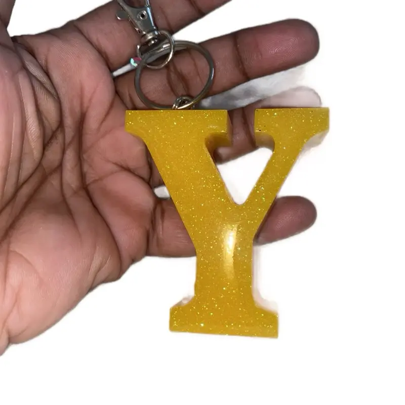 The Y Keychain with Yellow Glitter Stylish Accessory for Everyday Use