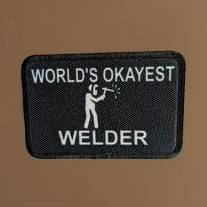 World's okayest Welder blue collar welding 2"x3" morale patch with hook and loop backing