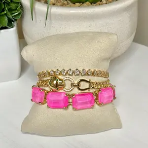 Pretty Sassy Bracelet Stack with Pink Gemstones and Gold Accents for Stylish Accessory Lovers