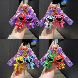 Smiling critters scary smiling animal doll keychain pink piggy blue elephant pendant