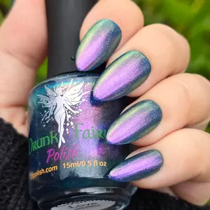 Cosmic Love Nail Polish by Drunk Fairy Polish | A Deep Navy Blue Jelly with Holo Flakies and a Bright Aurora Shimmer from Pink to Peach to Gold to Green on Top