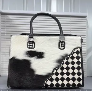 Genuine hand tooled leather & cowhide black and white double concealed carry tote bag