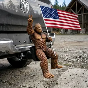 Independence Day Patriot Bigfoot Trailer Hitch Cover, Fun Sasquatch Statue Holding American Flag with Peace Gesture. Patriotic Truck Accessory & Waterproof Resin Sculpture, Unique Gift for Big Foot Lovers.