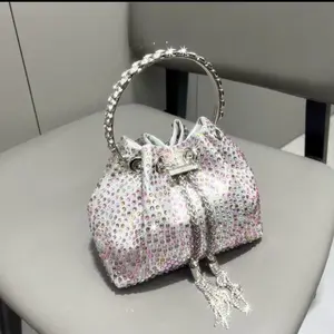 Sparkling Rhinestone Drawstring Bucket Bag with Tassel Detail for Elegant Occasions