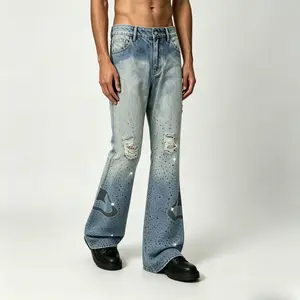 Men’s streetwear jeans with heat-applied rhinestones and distressed details, slightly flared, from a trendy brand
