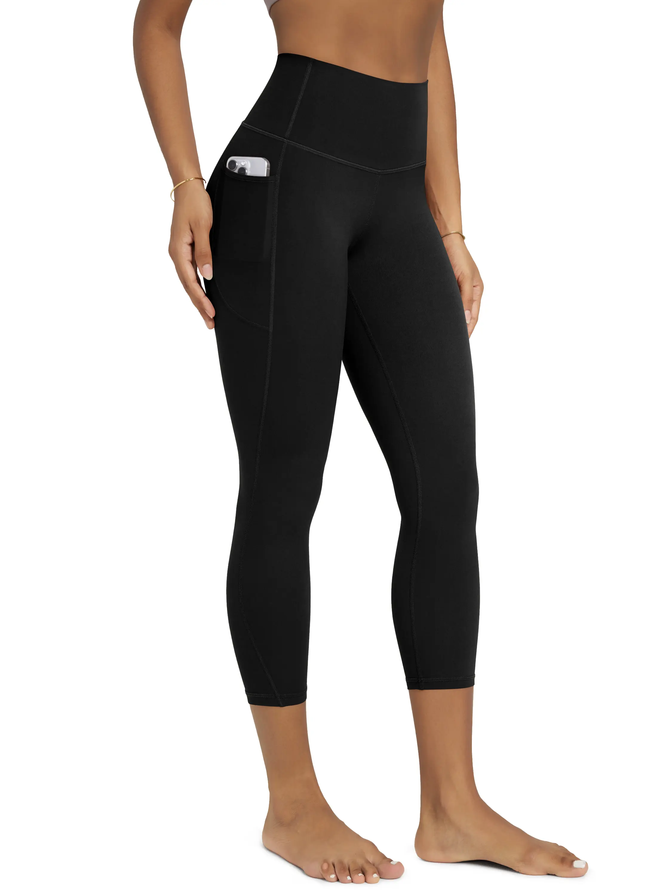 ODODOS Women's Buttery Soft Plain Weightless High-Waisted Leggings, 23" Gym Yoga Pants with Pockets, Gymwear Activewear for Lounge & Yoga, High Waisted Legging, Everyday Active, 4-Way Full Stretch, Female