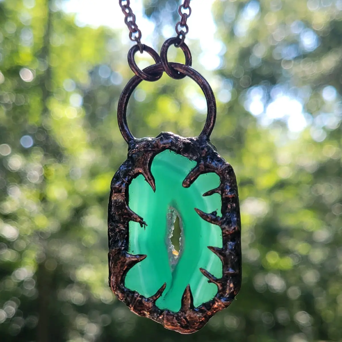 Pendant necklaces and earrings