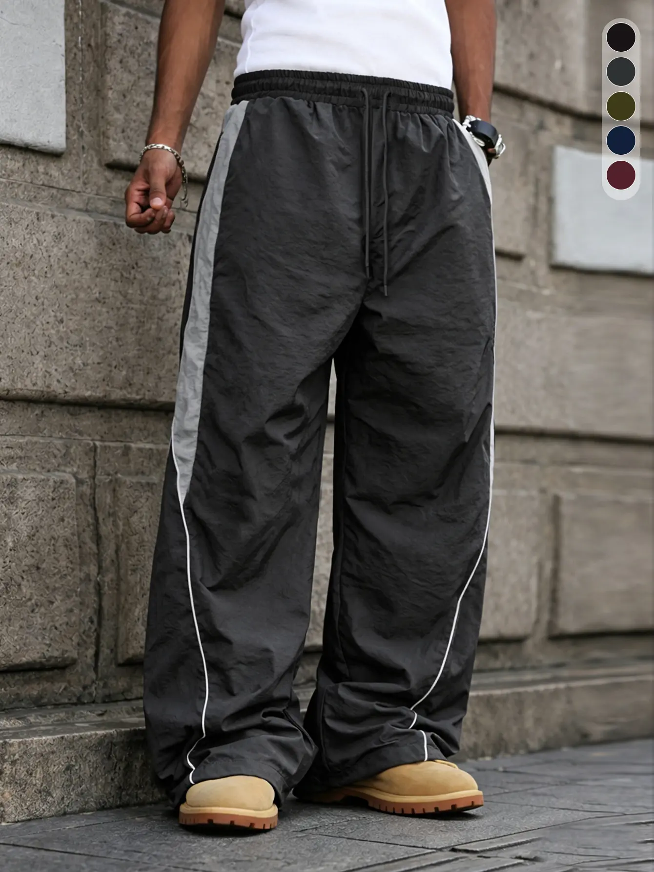 Men’s casual breathable pants, 100% polyester; comfortable street/Instagram style; retro straight-leg striped long pants; suitable for all seasons; loose wide-leg athletic pants; color-block wide-leg athletic pants.